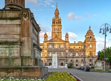 Article headline: ‘Frustrating and disheartening’: Glasgow community group blames council for delays to Covid memorial Image description: Glasgow City Chambers and George Square in Glasgow, Scotland