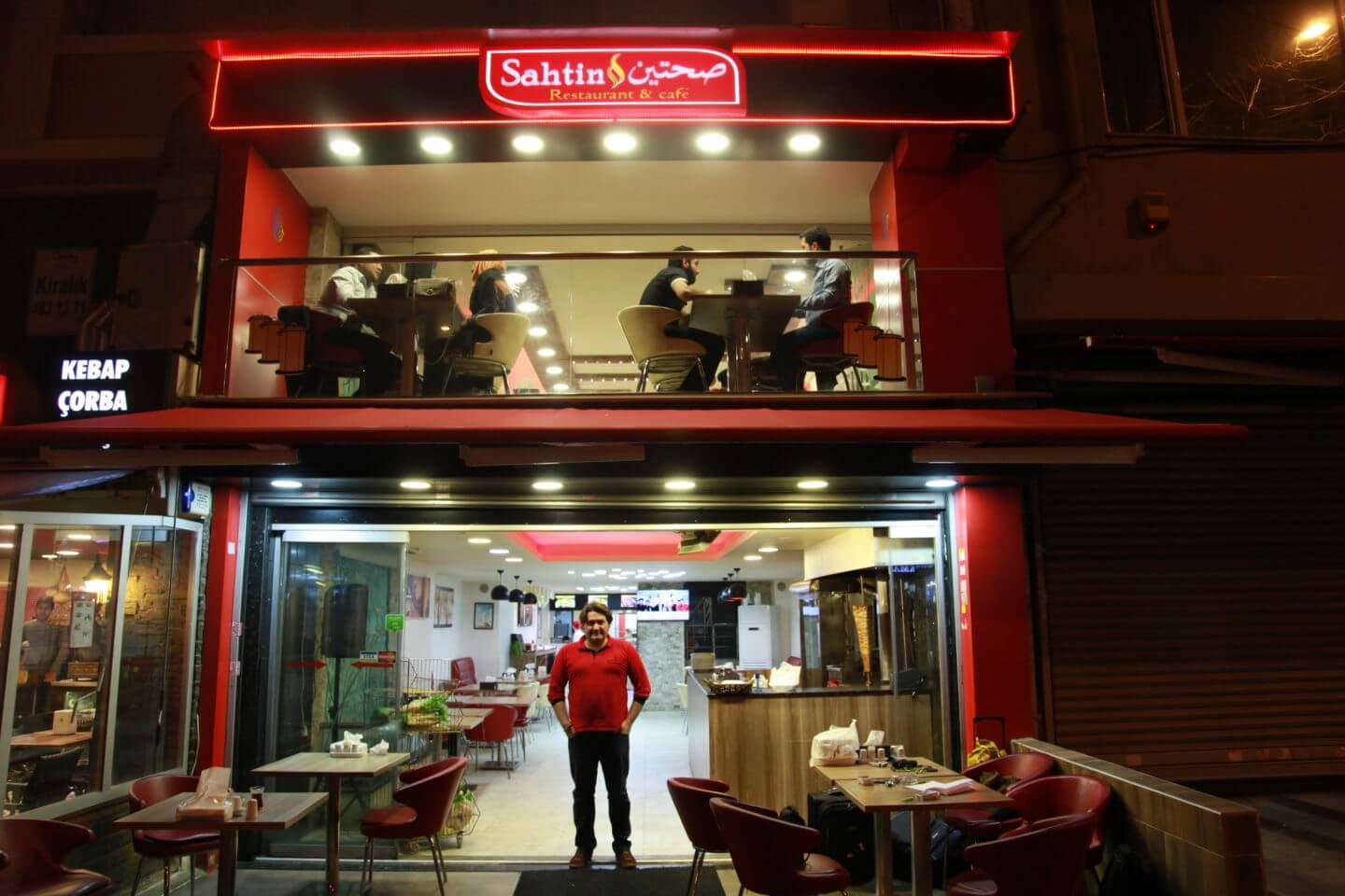 Samir Abboud in front of the restaurant he works in