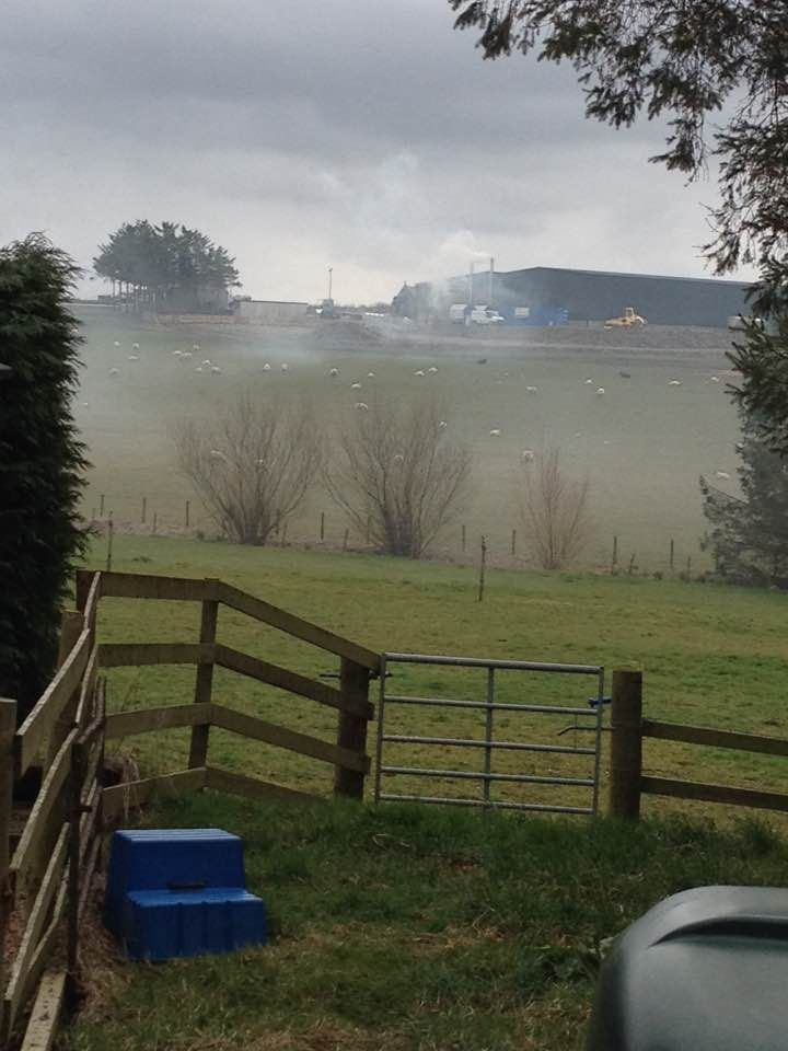 Smoke from a biomass boiler at Meikle Whiterashes, Aberdeenshire