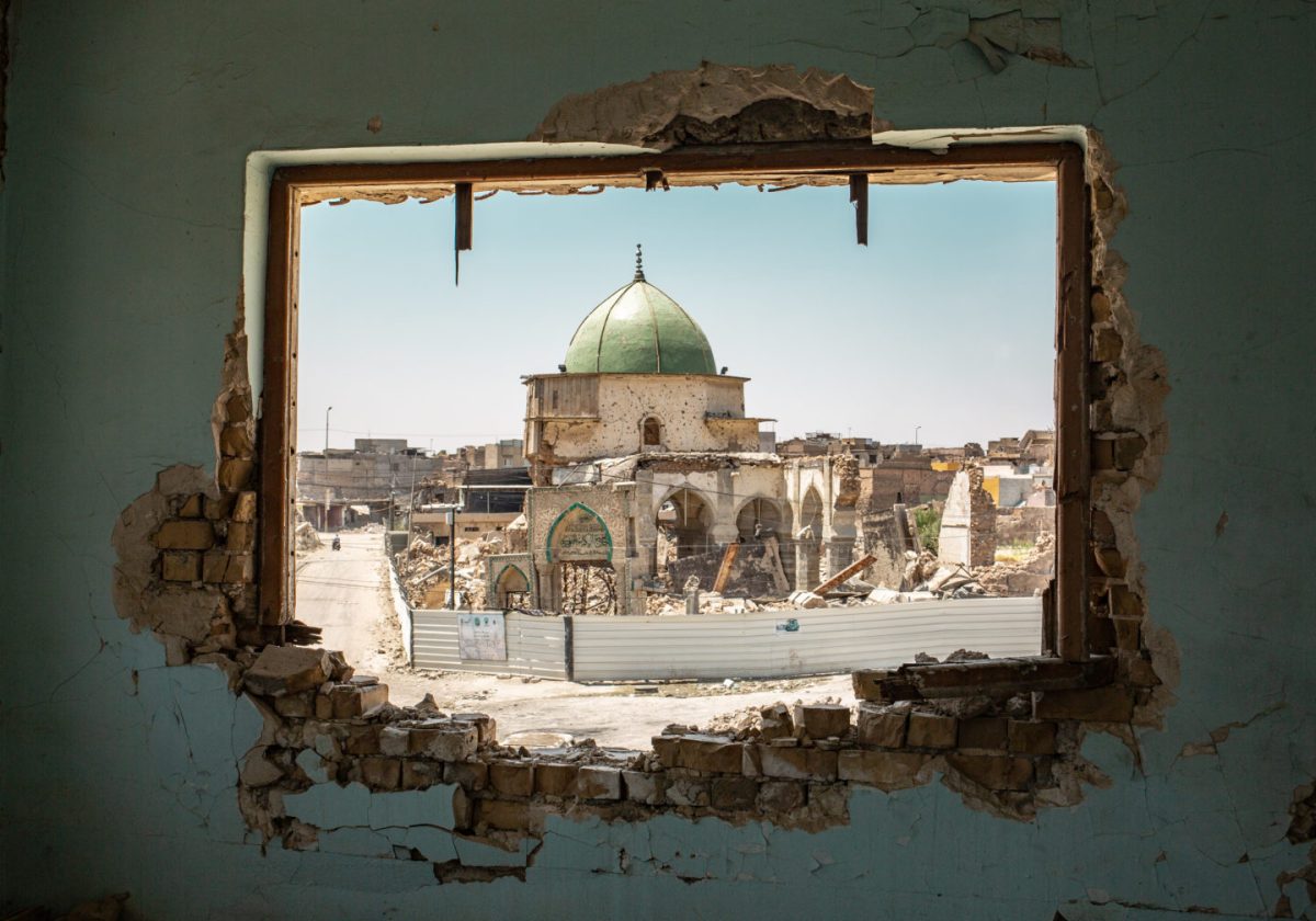 The Mosque of al-Nuri seen through a damaged window - West Mosul The Mosque of al-Nuri seen through a damaged window - West Mosul