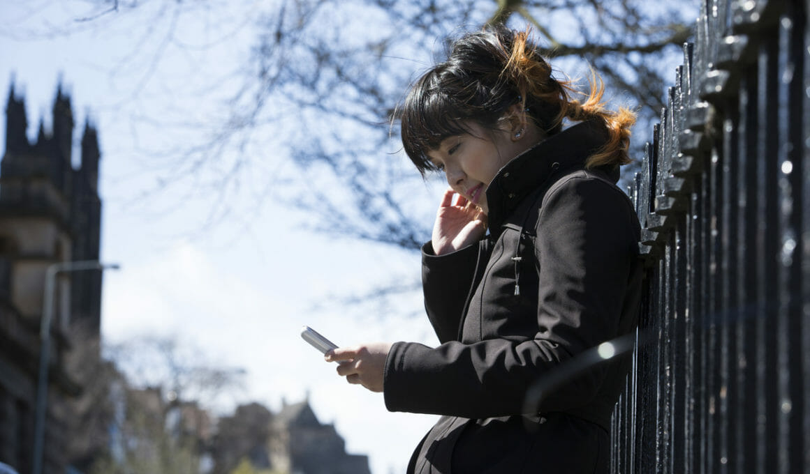 Young women on phone in Edinburgh