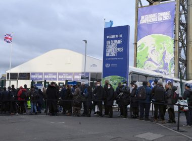 Delegates queue outside COP26