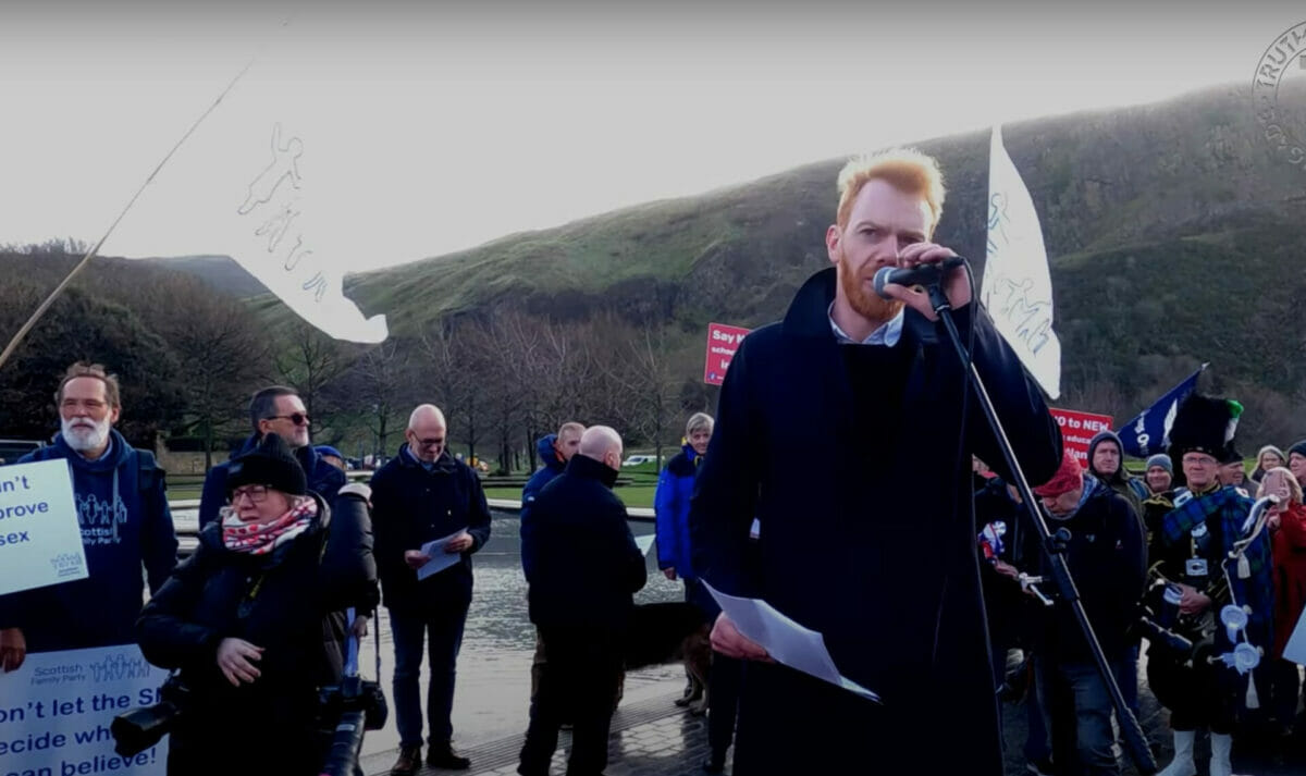 Niall Fraser of the Scottish Family Party addresses protestors
