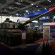 The Scottish Government has given over £8m in public grants to companies exhibiting at a London arms fair hosting states accused of human rights violations.