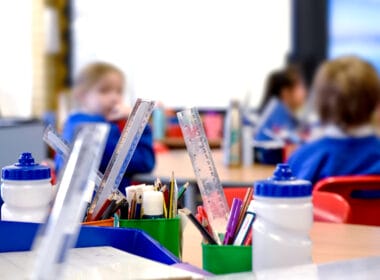 Image shows pupils in classroom. Scotland's education statistics released.