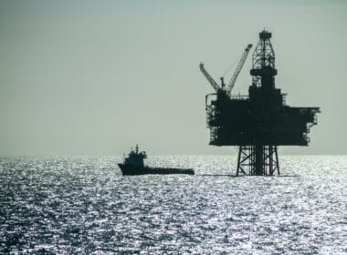 oil rig silhouetted in daytime