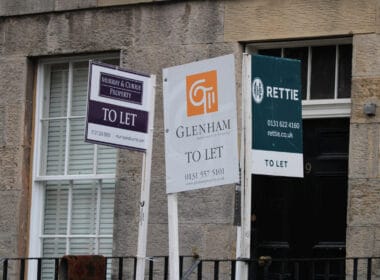 Letting agent signs advertising rental properties